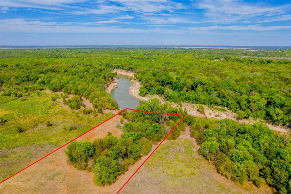 1500 Private Road 8496, Athens, TX 75832 Riverfront land offers a rare combination of water views and usable acreage.