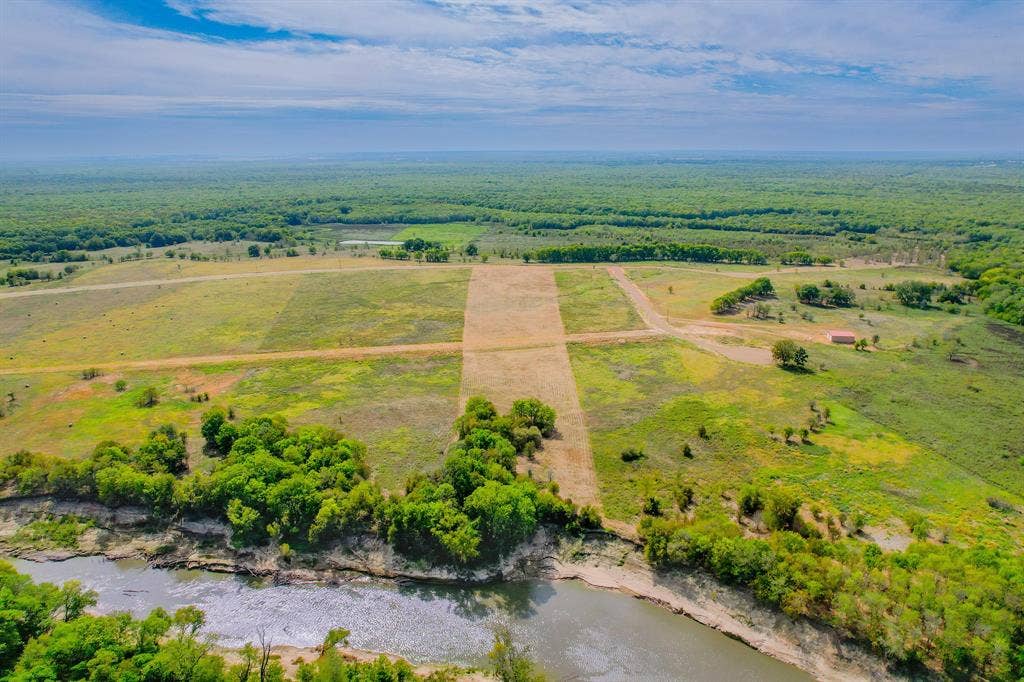 1500 Private Road 8496, Athens, TX 75832 Trinity River frontage offers peaceful water views and a serene East Texas country setting.