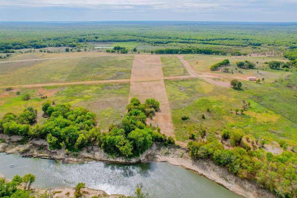 1500 Private Road 8496, Athens, TX 75832 Design a custom barndominium with river views, privacy, and access to the best of East Texas living.