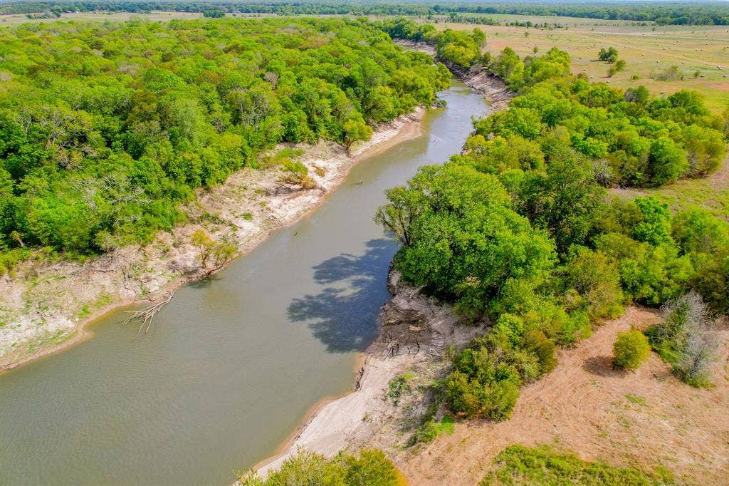 1500 Private Road 8496, Athens, TX 75832 Beautiful Trinity River views create a quiet escape from busy city living.