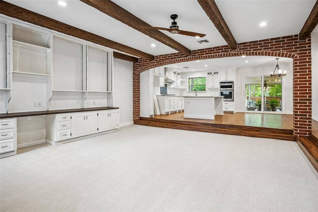 13430 Challaburton Drive, Farmers Branch, TX 75234 Spacious room featuring exposed wood beams and recessed lighting