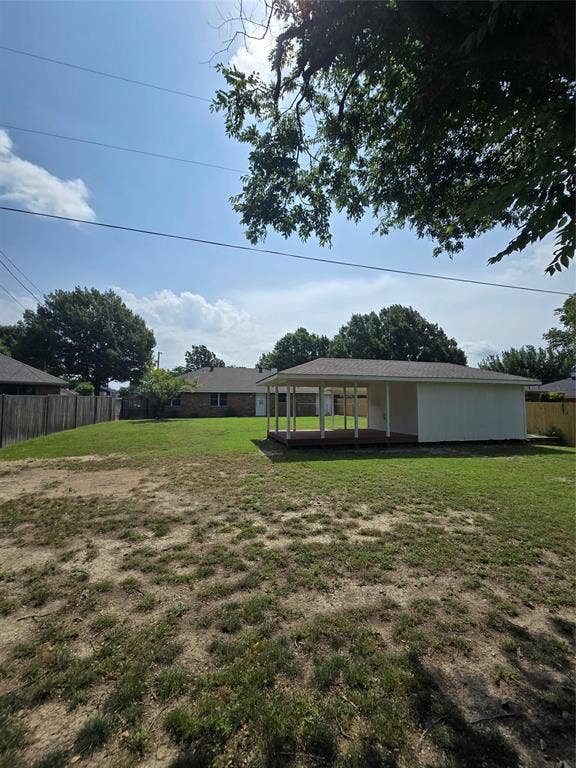 9 Marvin Gardens, Midlothian, TX 76065 Building and deck from back fence