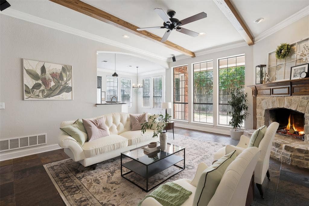 4305 Loch Haven Court, McKinney, TX 75072 Virtually staged. Spacious living room with fireplace.