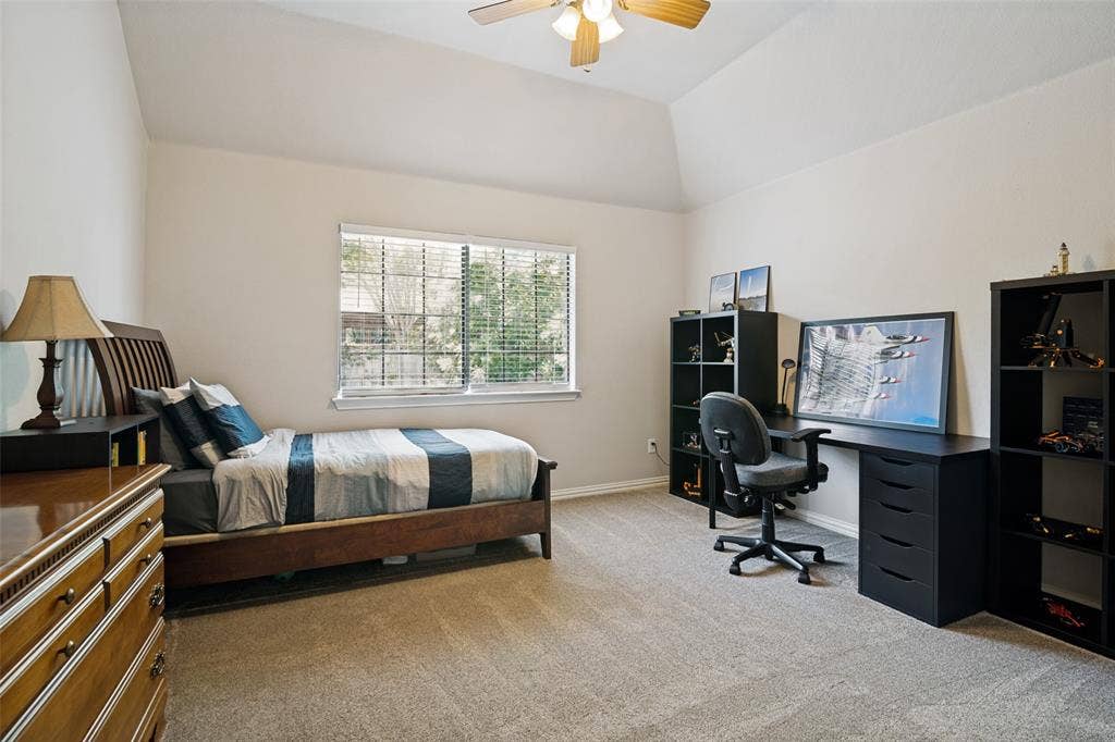 4305 Loch Haven Court, McKinney, TX 75072 Vaulted ceilings with a ceiling fan, window with blinds, and neutral carpeting