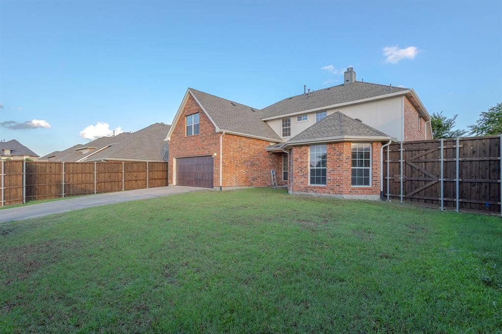 1200 Talley Lane, Frisco, TX 75033 View of yard with a garage