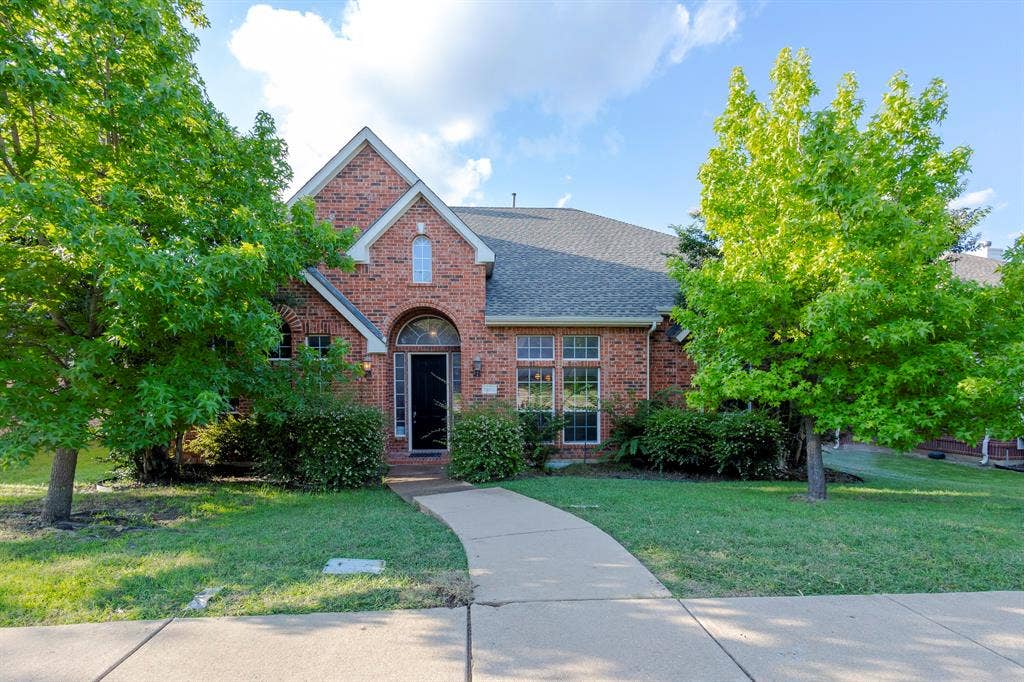 1200 Talley Lane, Frisco, TX 75033 View of front of home with a front yard