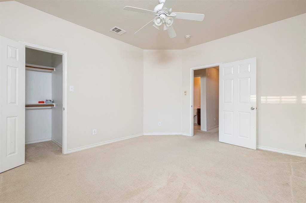 1200 Talley Lane, Frisco, TX 75033 Unfurnished bedroom with light carpet, a closet, and ceiling fan