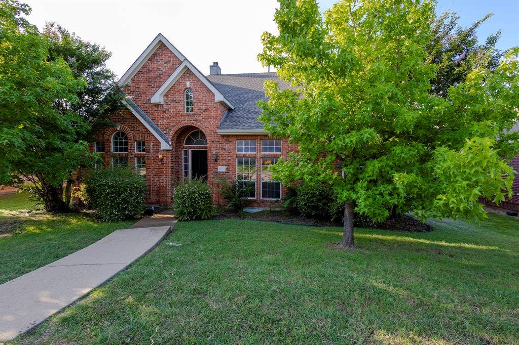 1200 Talley Lane, Frisco, TX 75033 View of front of house with a front yard