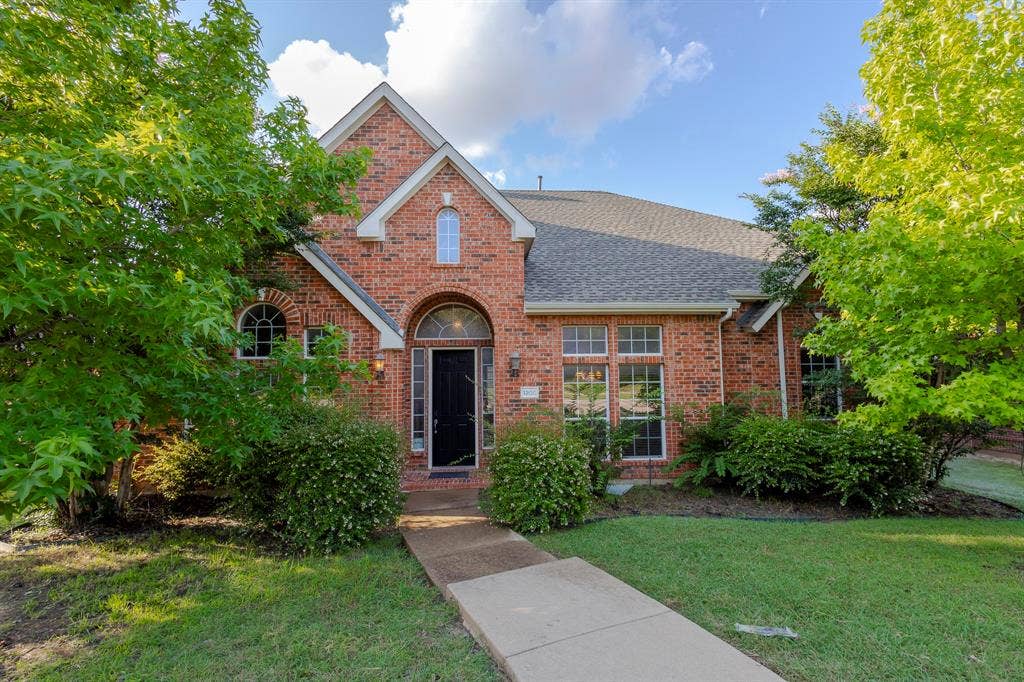 1200 Talley Lane, Frisco, TX 75033 View of front of home featuring a front yard