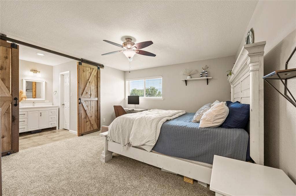5656 Oak Haven Drive, Fort Worth, TX 76244 A peaceful primary bedroom gives you your own quiet corner of the home when it is time to recharge.