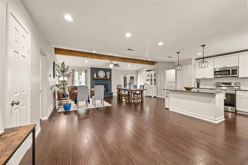 5656 Oak Haven Drive, Fort Worth, TX 76244 Step inside to an updated open layout where the kitchen, dining, and living spaces all connect for easy everyday living.