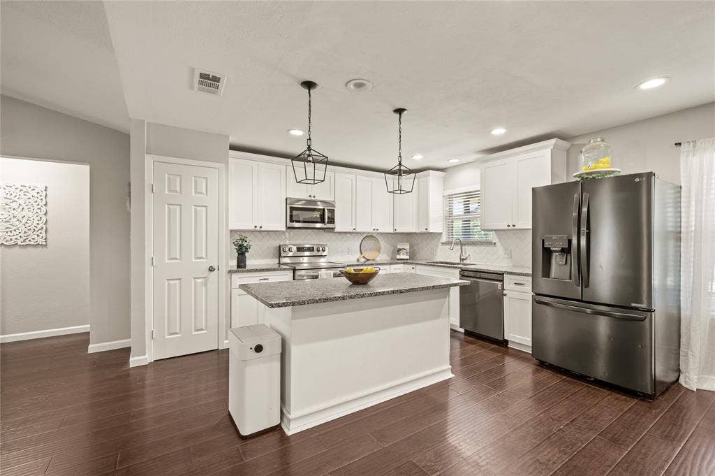 5656 Oak Haven Drive, Fort Worth, TX 76244 The 2022 kitchen remodel, granite counters, new appliances, and fresh updates make this main area feel clean, useful, and ready to enjoy.