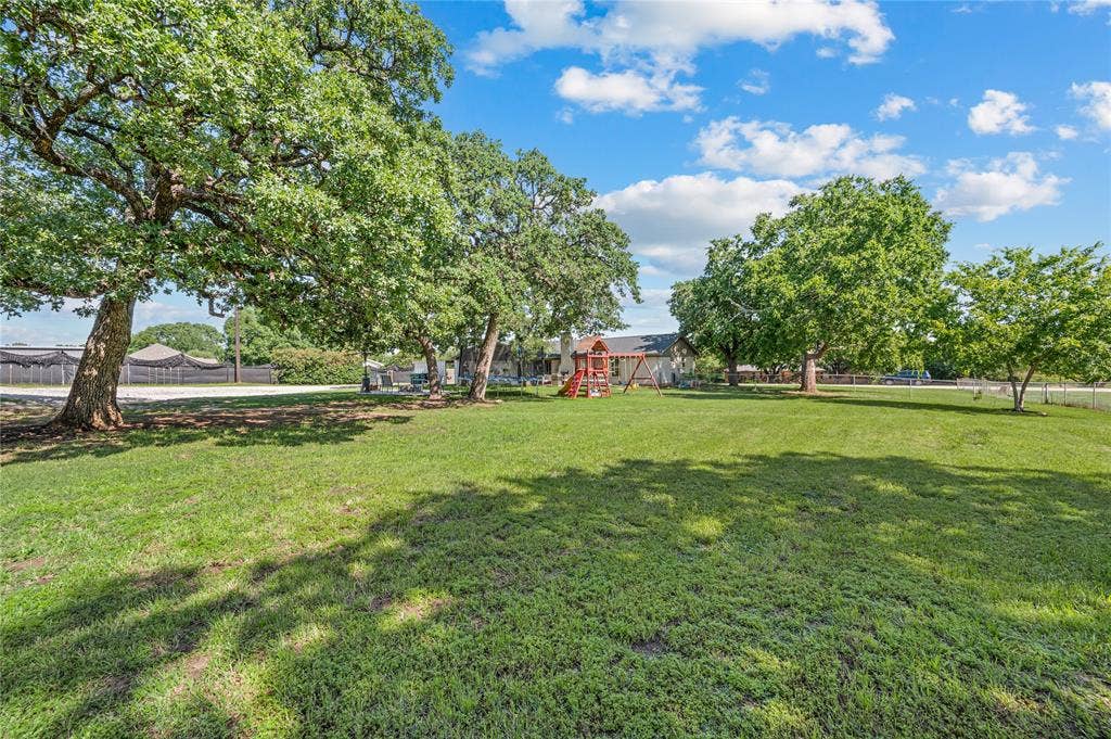 5656 Oak Haven Drive, Fort Worth, TX 76244 Big backyard energy is real here, with space for pets, parties, kids, hammocks, cookouts, and quiet nights by the firepit.