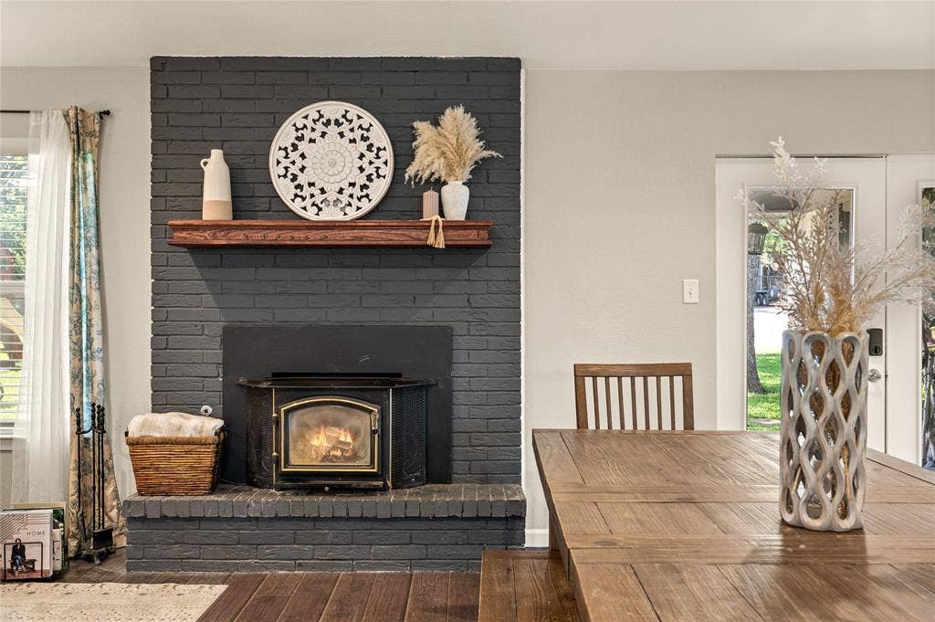 5656 Oak Haven Drive, Fort Worth, TX 76244 The fireplace insert gives the living room that cozy center point everyone naturally gathers around.