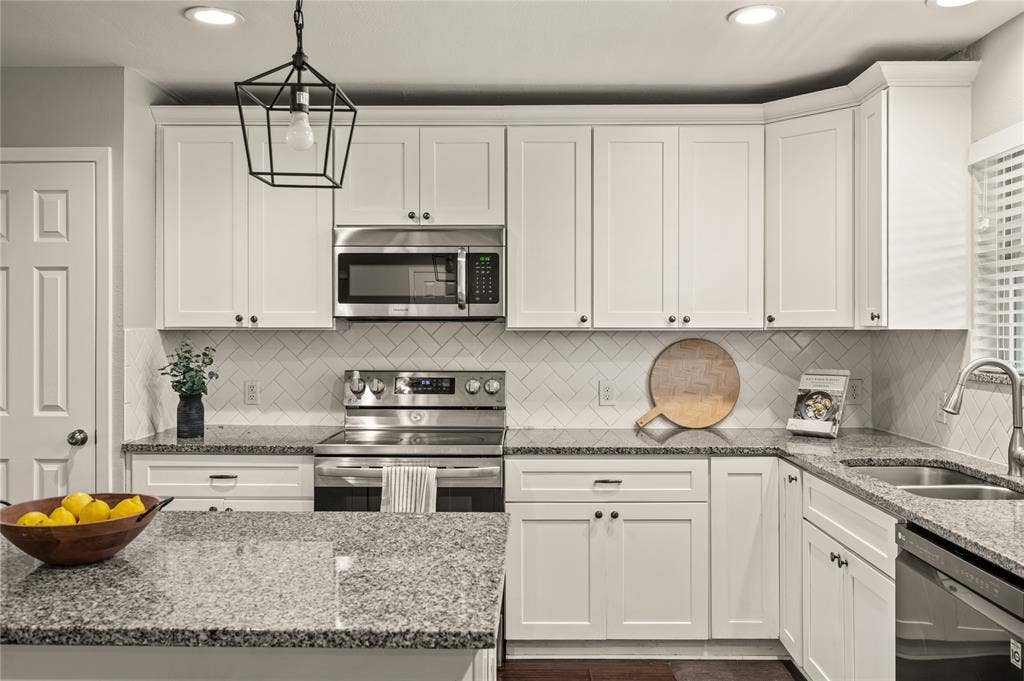 5656 Oak Haven Drive, Fort Worth, TX 76244 The kitchen was remodeled in 2022 and is ready for real everyday living, with granite counters, new appliances, and an open setup that keeps everyone connected.