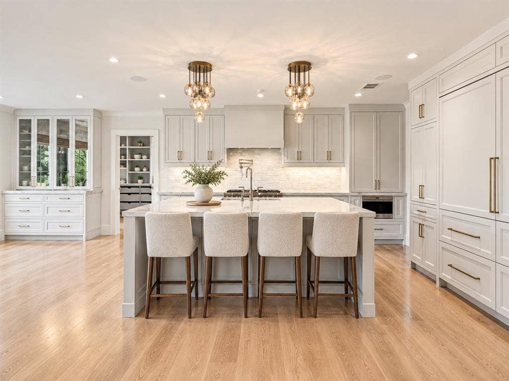 Kitchen Island and doorway to Walk-in Prep Kitchen/Pantry