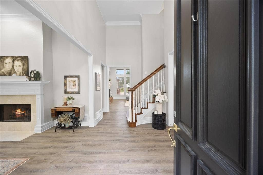 621 Liechty Court, Heath, TX 75032 Towering ceilings and impressive staircase welcome your arrival