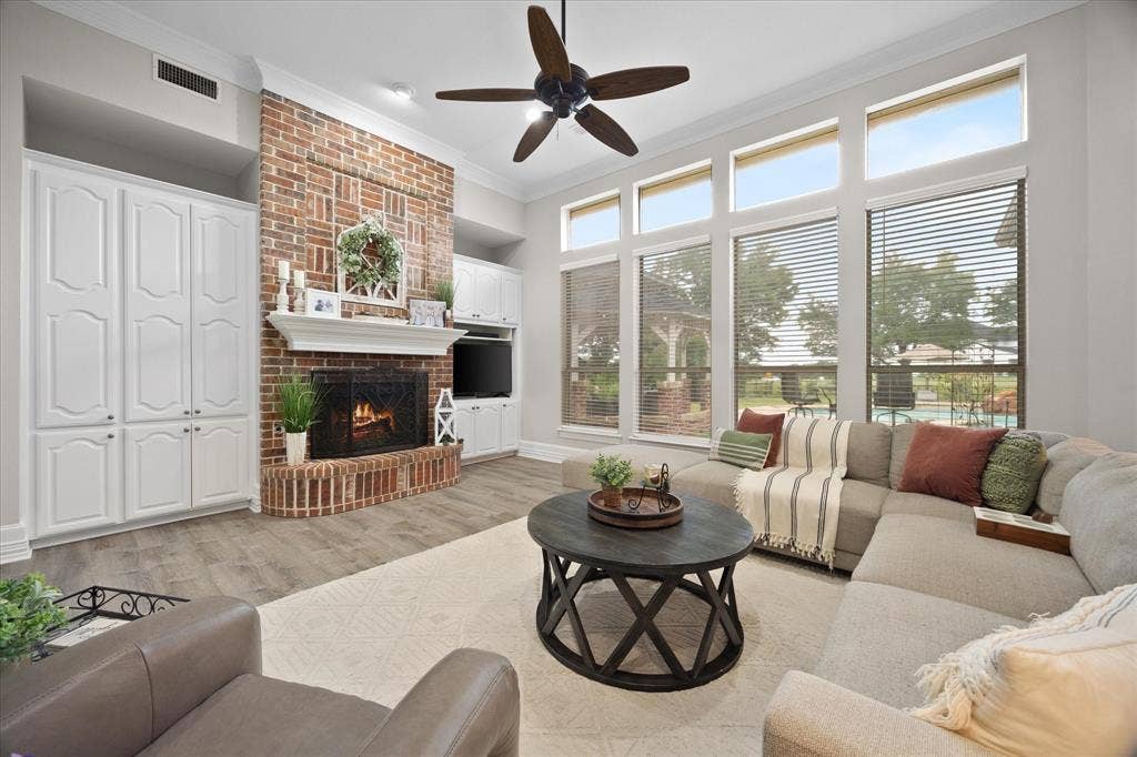 621 Liechty Court, Heath, TX 75032 Floor to ceiling windows provide ample lighting and provide stunning views of pool and golf course