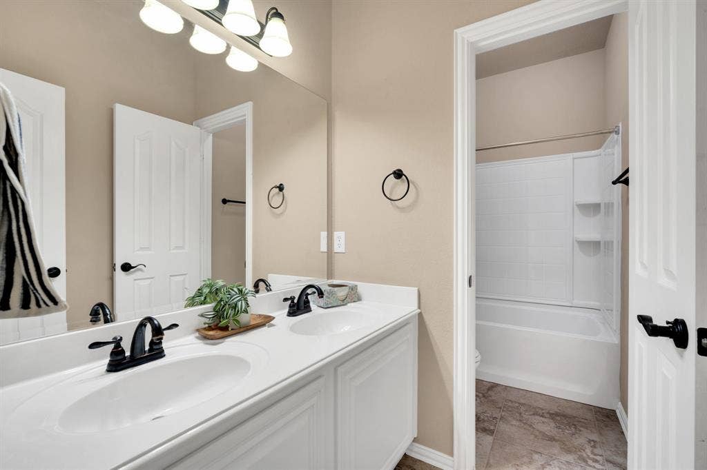 5214 Compassion Court, Midlothian, TX 76065 Guest bathroom by the bedrooms and laundry room