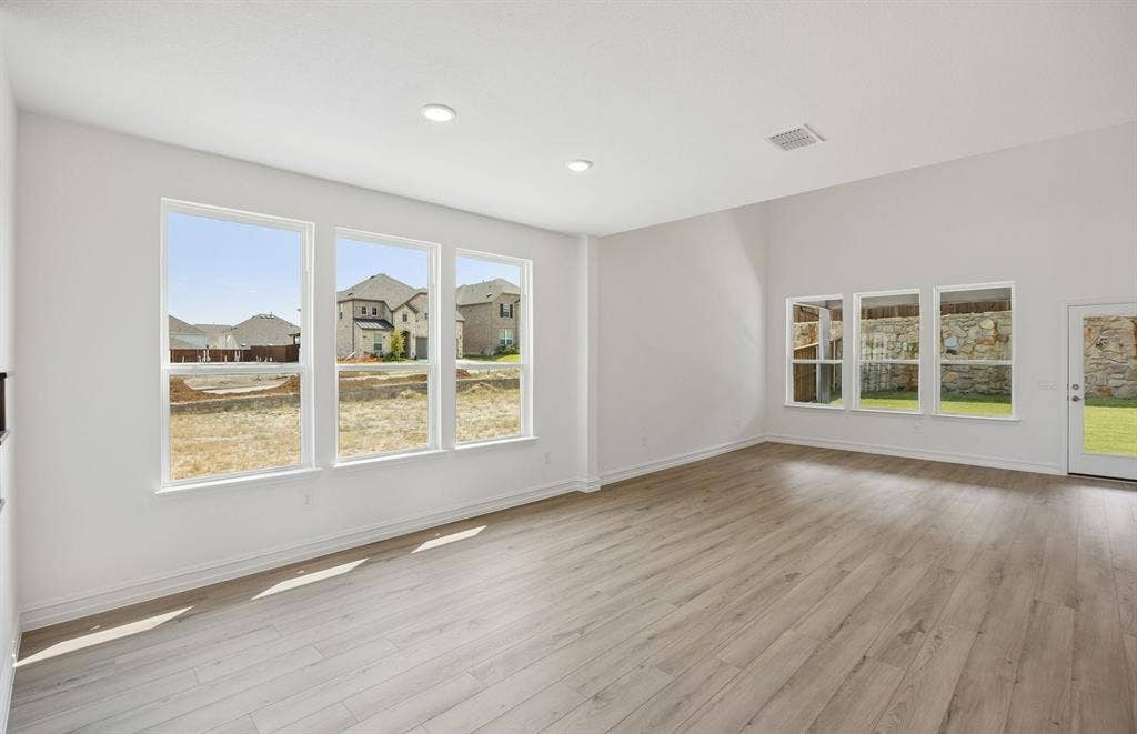 Large windows and natural light in gathering room