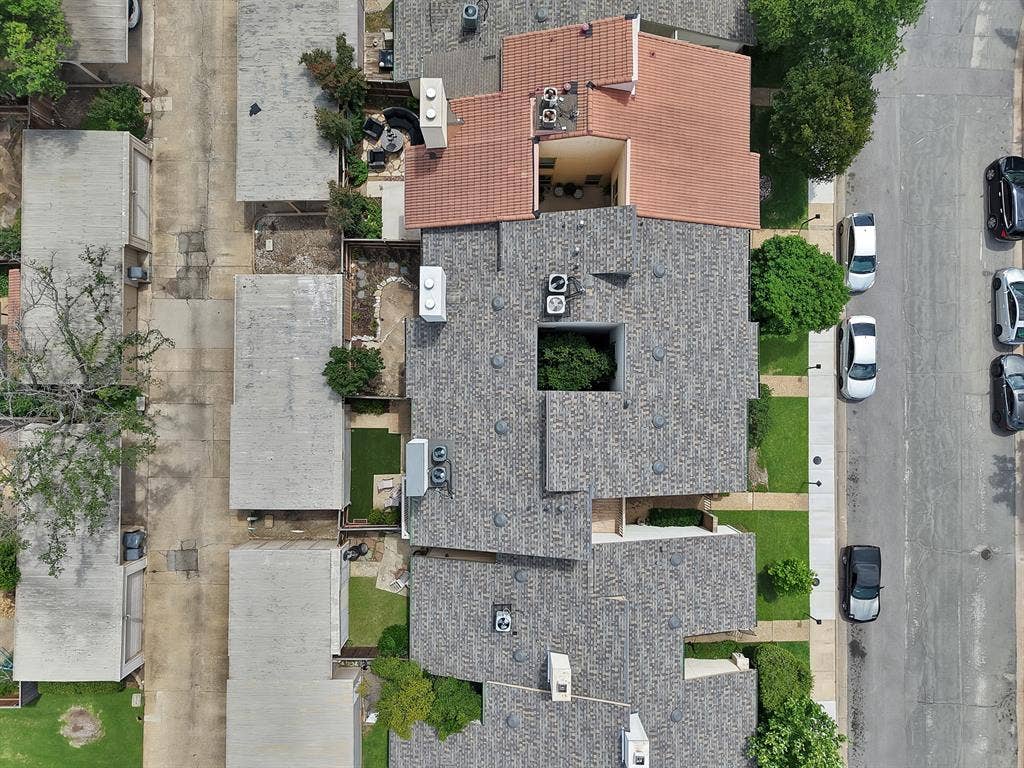 12574 Burninglog Lane, Dallas, TX 75243 Aerial perspective showcasing textured shingle roofing