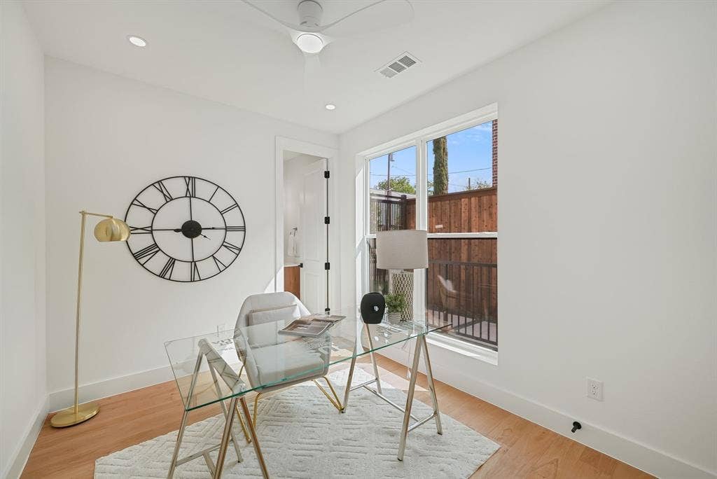 4715 Manett Street, #102, Dallas, TX 75204 Bright room featuring light wood-finish flooring, white walls, a multi-pane window, and recessed lighting