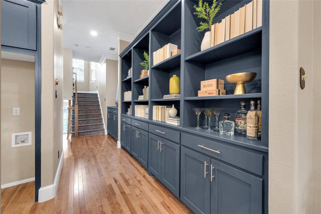 5102 Ridgedale Avenue, Dallas, TX 75206 Custom built-in shelving with lower cabinetry and brushed nickel hardware