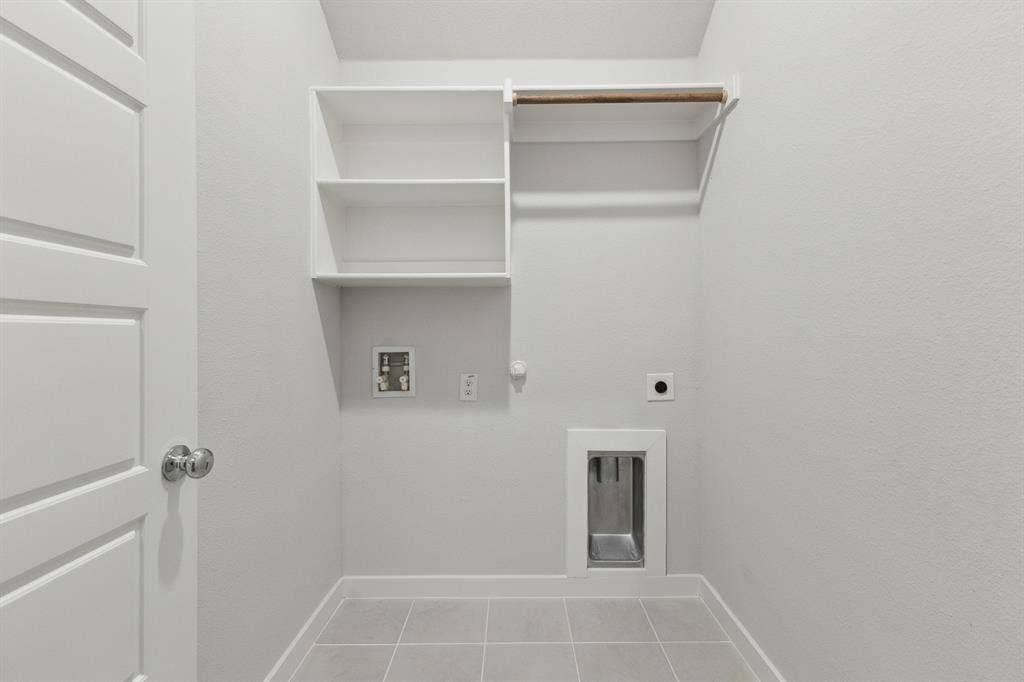 Utility room in the Quartz home plan by Trophy Signature Homes – REPRESENTATIVE PHOTO