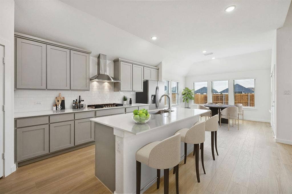 461 Hocking Hills Drive, Waxahachie, TX 75165 Kitchen in the Gilmour II home plan by Trophy Signature Homes – REPRESENTATIVE PHOTO