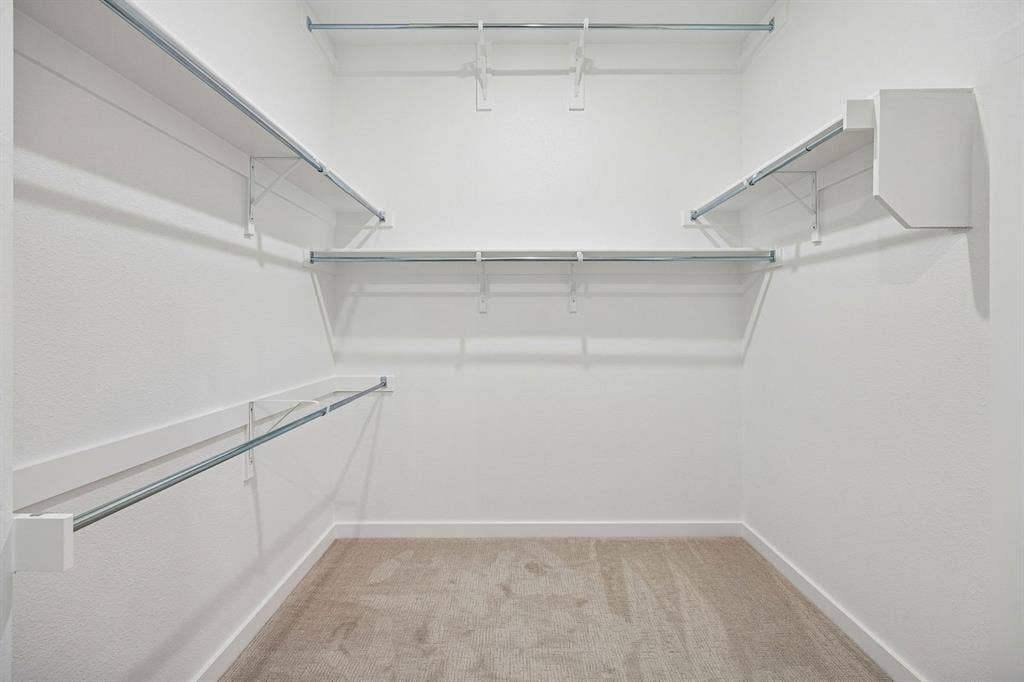 461 Hocking Hills Drive, Waxahachie, TX 75165 Primary Closet in the Gilmour II home plan by Trophy Signature Homes – REPRESENTATIVE PHOTO