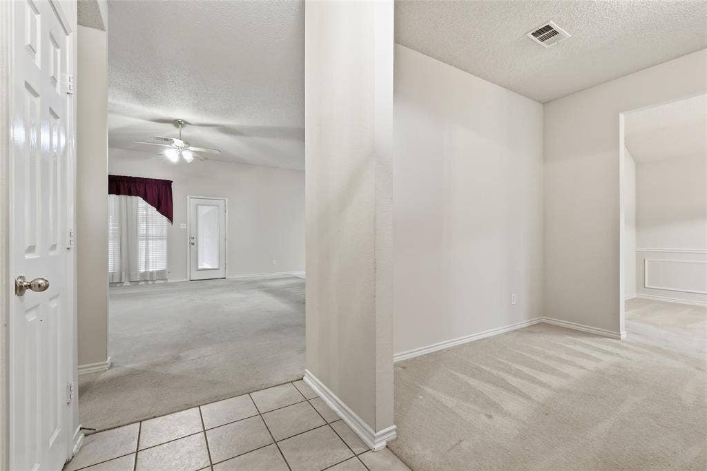 3611 Cedar Creek Lane, Sachse, TX 75048 Front entryway - living dining rooms to right, leads into family room