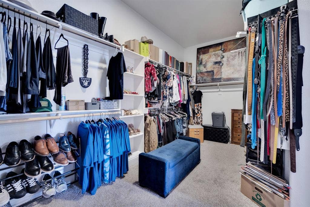 HUGE primary closet with so much storage space!