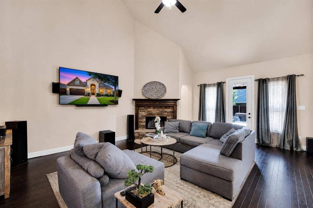 Another view of the large living area with fireplace-so much room here for entertaining!