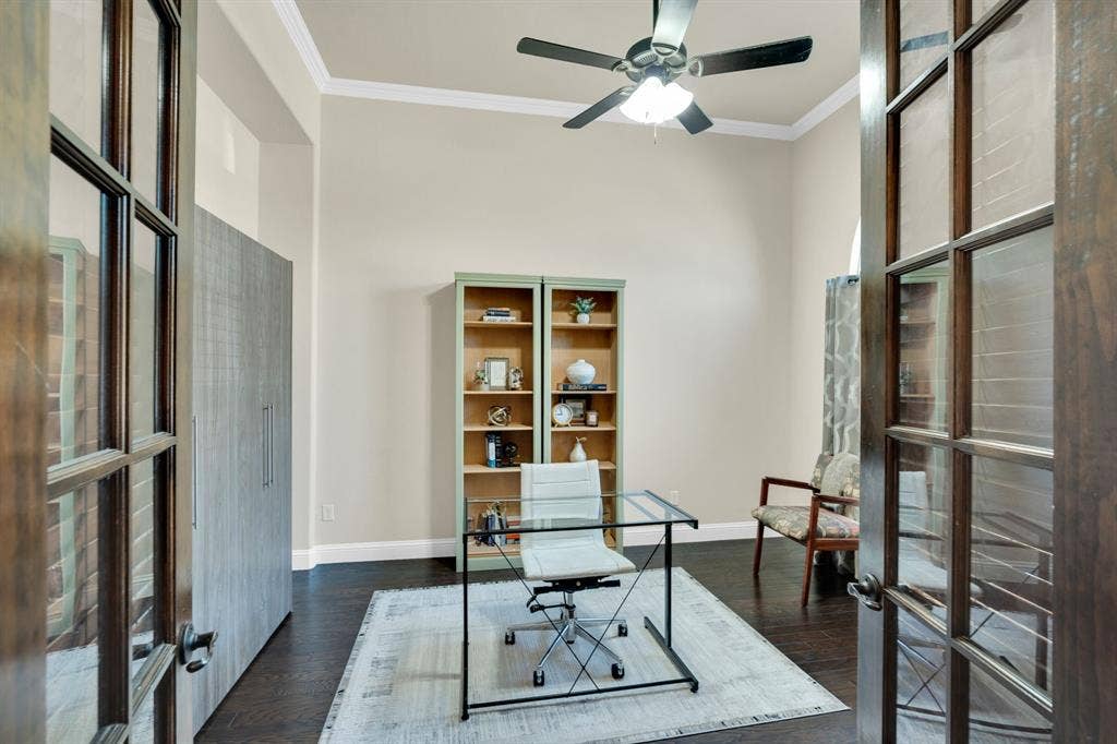 Office with French doors, or use this room as a 5th bedroom. The Murphy bed conveys!