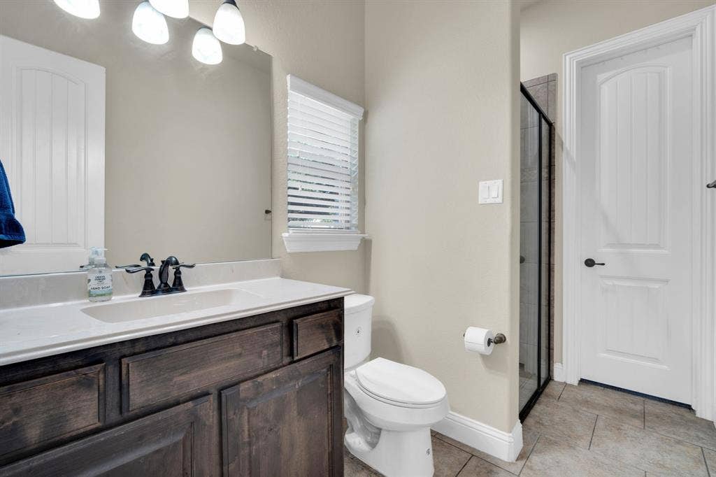 Full bath ensuite with shower.