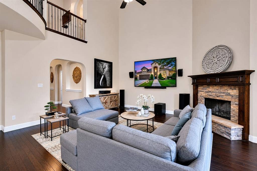 Another view of the living area showing off the upstairs balcony area.