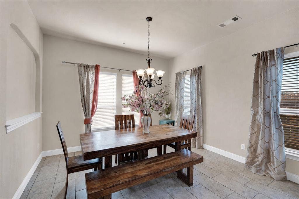 Breakfast area with decorative lighting and tons of natural light.
