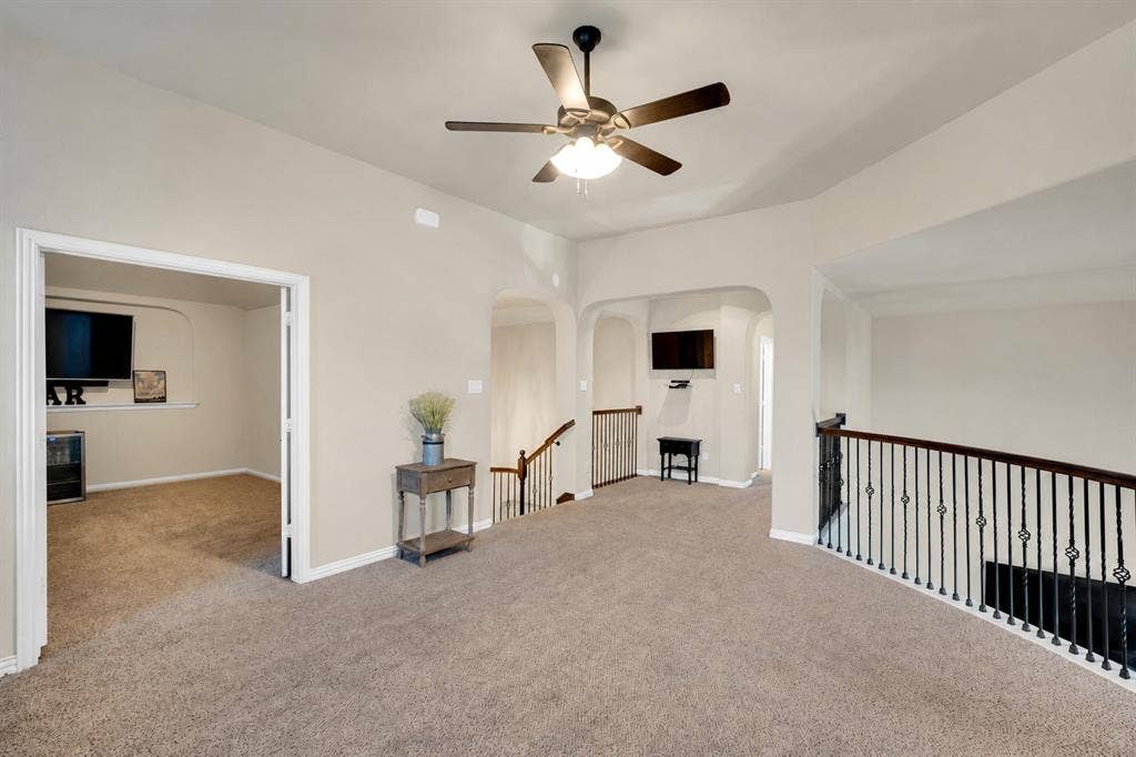 Upstairs game room-plenty of room here for a pool table and lounge area!