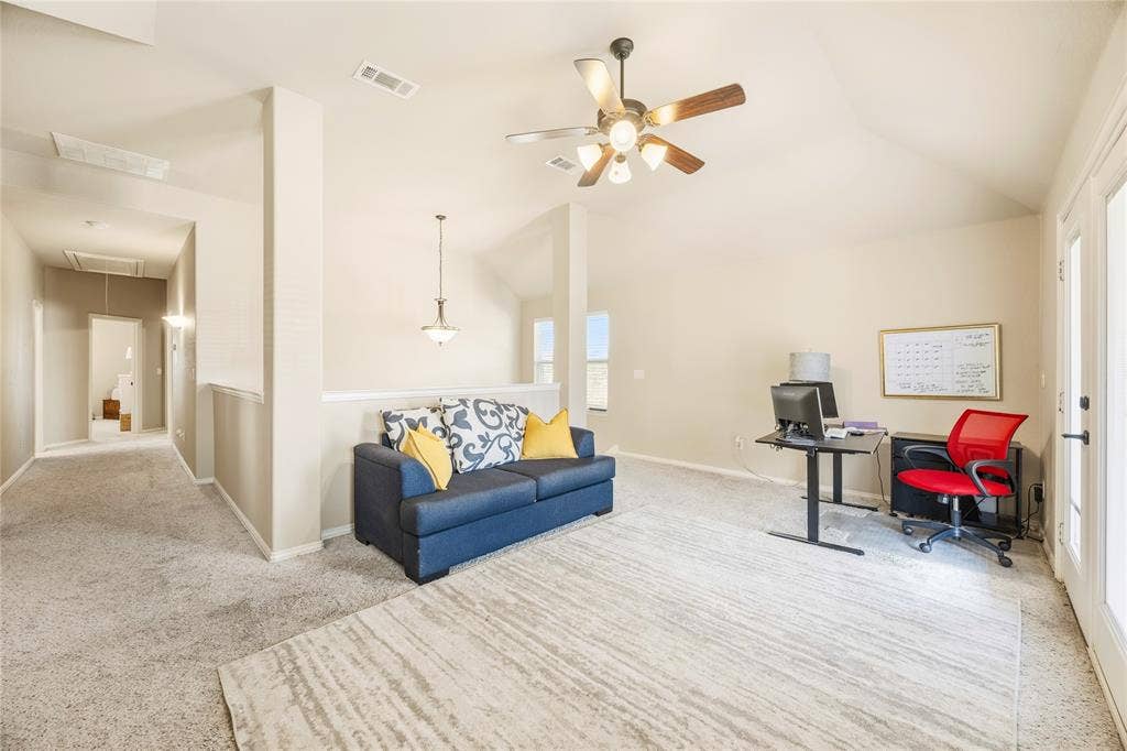 1133 Vickery Drive, DeSoto, TX 75115 At the top of the stairs is a room that can be game room, office, flex space? You call it! Enjoy the balcony for a quiet escape.