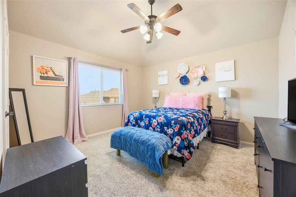 1133 Vickery Drive, DeSoto, TX 75115 4th bedroom - 2nd floor. Carpeted room featuring a ceiling fan, a window with blinds, and neutral wall paint.