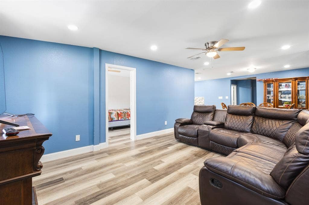2006 Fort Worth Street, Grand Prairie, TX 75050 Spacious interior featuring wood-finish flooring, recessed lighting, a ceiling fan, and a wide entryway