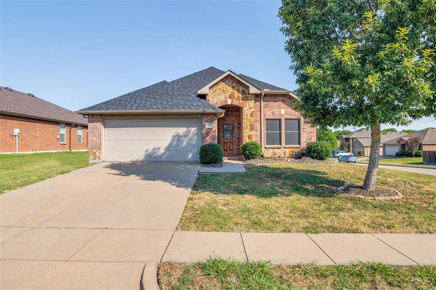 Property photo for 707 Windflower Drive, Fate, TX