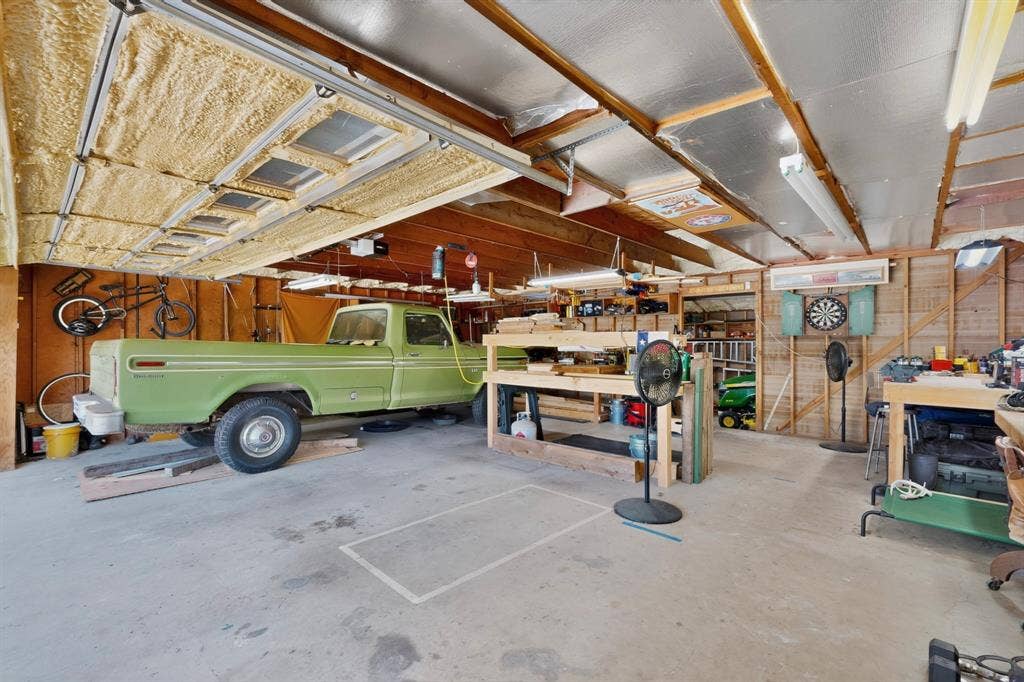 1151 Lynn Way, Waxahachie, TX 75165 Detached two car garage with insulated door. Currently being used as a workshop.