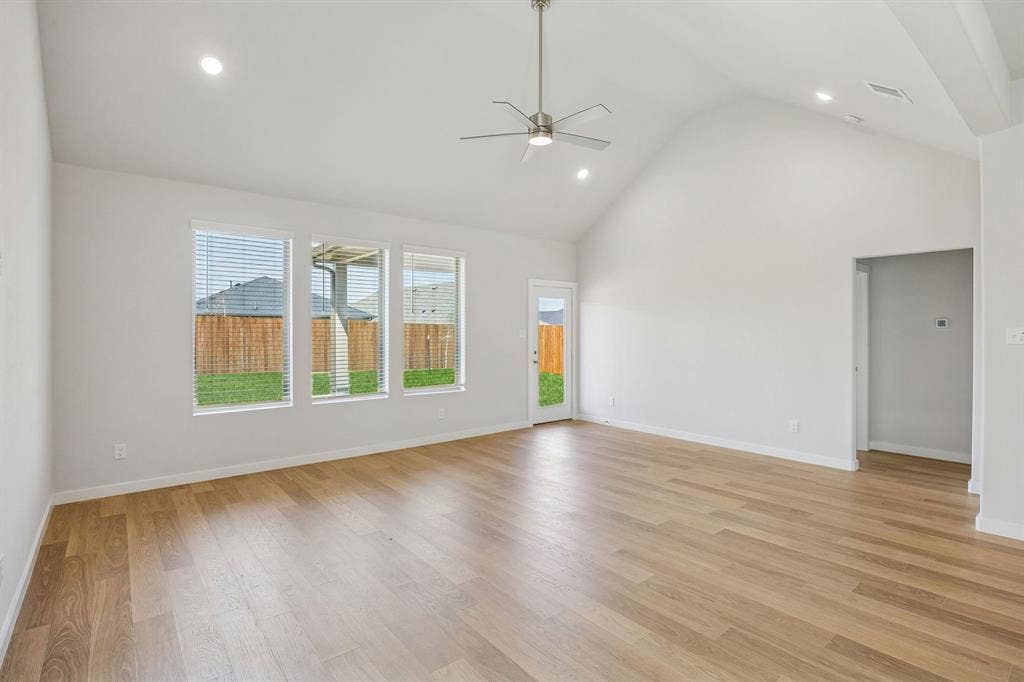 481 Hundred Acre Drive, Waxahachie, TX 75165 Living Room in the Stanley II home plan by Trophy Signature Homes – REPRESENTATIVE PHOTO