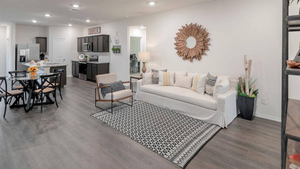1627 Blaire Drive, Tyler, TX 75702 Open-concept living space featuring wood-finish flooring, recessed lighting, and white walls