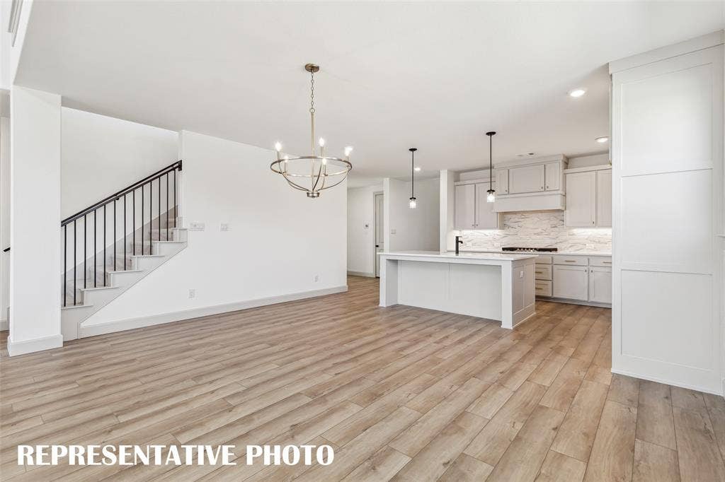1290 Chickadee Street, Prosper, TX 75078 Whether it's lively dinner parties or cozy family meals, this dining room fits all occasions! REPRESENTATIVE PHOTO