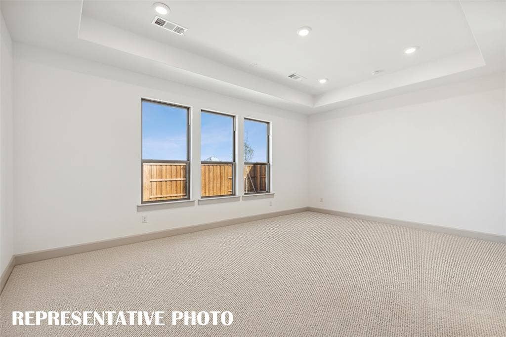 1290 Chickadee Street, Prosper, TX 75078 Your dreamy new owner's suite is located at the rear of the home for additional privacy. REPRESENTATIVE PHOTO