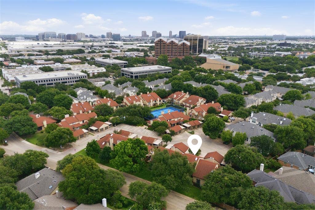4130 Proton Drive, #47B, Addison, TX 75001 La Mirada with the unit location pinned, showing the community's tree-canopied layout, clay tile rooflines, on-site tennis court, and pool — all just minutes from Addison's dining and business corridor visible in the background