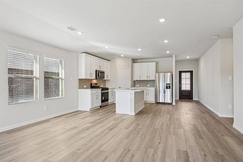 3057 Texoma Boulevard, Farmersville, TX 75442 Photo is not of the actual home, but is an inspirational photo of builder’s model home and may depict options, furnishings, and/or decorator features that are not included.