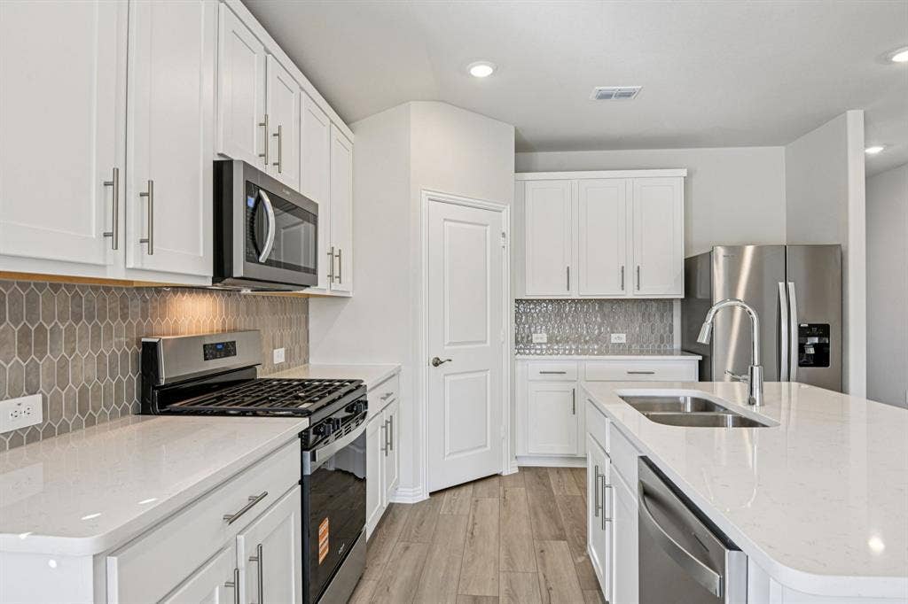 3057 Texoma Boulevard, Farmersville, TX 75442 Photo is not of the actual home, but is an inspirational photo of builder’s model home and may depict options, furnishings, and/or decorator features that are not included.